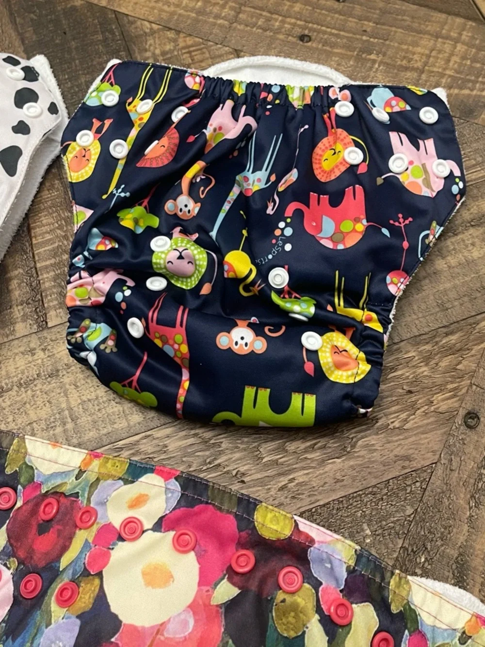Sunbaby reusable cloth baby diapers with adjustable snaps to grow with baby